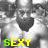 Black-and-white pixelated image of a bearded man in multiple repeated poses with yellow-green text "SEXY" overlaid on four corners.