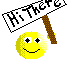 Pixelated static icon featuring a yellow smiley face holding a brown stick with a black-and-white sign reading "HI MATE!" against white background.
