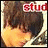 A pixelated anime-style character with brown hair and orange clothing, shown in two side-by-side frames where the left frame contains red text above the head.