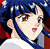 Pixelated anime-style character with blue hair, brown eyes, and a pink mouth, wearing a blue and red outfit against a blue background.