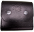 Dark gray rectangular shape with two bright white circular spots on the upper left and right, set against a gradient background transitioning from dark to light gray.