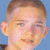 repeated child faces with red star outlines on yellow and blue backgrounds, plus a pink banner with Hebrew text