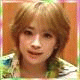 Four- shows a person with light brown hair in a green and blue patterned shirt against an orange background, displaying different facial expressions and hand gestures