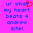 Pixelated text on bright pink background with red heart symbol replacing 't' in 'what', blue letters, static image.
