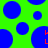 Green background with scattered blue circles, some containing red L-shaped symbols.