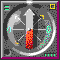 Animated compass with rotating red-and-white needle, circular gray dial marked with green and yellow indicators, small white dot on upper right.