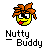 Pixelated character with orange spiky hair, yellow face, black eye outlines, white eyes with black pupils, red tongue sticking out, and text below reading 'Nuttty Buddy' in black and white.