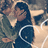 Pixelated image of two people embracing with a heart symbol, text reading "I should tell you" and "Roger + Mimi <3" below.