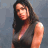 A woman with long dark hair wears a sleeveless top in two color variations, the background shifts from blue to brown and back to orange across frames.