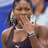 Pixelated static image of a tennis player in mid-action with blurred background, likely from an AOL Instant Messenger buddy icon set.