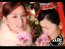 Animated sequence of people in traditional Chinese attire with red backgrounds, featuring repeated circular logos.
