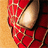 Spider-Man's red and blue mask with web pattern, featuring large white eyes, on a blue background with white text reading 'SPIDER-MAN', 'SONY.COM/', and 'SPIDER-MAN'.