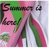 A static image with pink, green, and white striped fabric background and black cursive text reading 'Summer is here!' with a small green and white floral design.