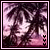 Animated palm trees against a pinkish-purple sky with small white and black symbols changing in the lower-right corner.