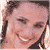 A pixelated image of a smiling person with dark hair on the left, next to green text reading 'Original Icons .com' on a solid dark background.