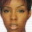 Static 48x48 pixel icon showing a close-up of a person's face with short dark hair, brown skin tone, and neutral expression against white background.
