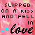 Pixelated text reads 'SLIPPED ON A KISS AND FELL IN love' with cyan hearts on a pink floral background, animated by changing heart count.
