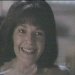 Static 75x75 pixel buddy icon showing a person with dark hair and light skin smiling, captured from a low-resolution source image at reviewImagePixels size.