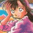 A pixelated anime-style character with brown hair and green eyes in a pink outfit, next to stylized text on a black background.