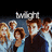 Pixelated image of multiple people with a partially visible text banner above them on dark background.