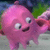 A pink octopus-like creature with large eyes and a smiling mouth appears on the left, while a green jellyfish with big eyes floats against a blue background on the right.
