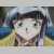 Pixelated image of a character with dark hair, light skin, and green eyes, set against a blurred background with blue and yellow tones.