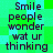 Green and cyan pixelated background with dark text reading "Smile people wonder wat ur thinking" repeated in two vertical