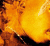 A pixelated contact sheet of two frames from an animated icon featuring a close-up of a person's face with fiery orange and yellow tones, alongside stylized text elements on black backgrounds.