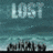 Pixelated static image with teal background showing partial text 'LISI' at top and dark shapes resembling buildings along the bottom edge.