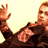 Pixelated static image of a person in dark clothing with raised hand against light background, likely from historical AOL Instant Messenger buddy icon collection.