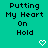 Green background with repeated text "Putting My Heart On Hold" and white pixelated hearts in a pattern