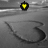 Pixelated icon with yellow heart symbol on black background above dark curved shape on gray gradient background.