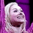 Pixelated image of a person with light hair against purple background, orange text on pink background reads "Whoever said TANGERINE was the new PINK... ...was SERIOUSLY DISTURBED!".