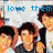 Pixelated image of five young men in casual clothing with text overlays, showing animation changes between frames.