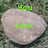 Three light gray rocks on green grass with bright green text reading 'you rock', 'rock', and 'my world!' in pixelated font.