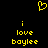Yellow pixelated heart symbol above two identical text blocks reading 'i love boylee' on black background.