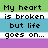 Pixelated text on horizontal color bands: green, white, blue, white, purple, gray. Text reads 'My heart is broken but life goes on...' and 'He was My world I just want Him to say 'Be my Girl''.