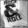 Black-and-white image of a white t-shirt with 'ROCK & ROLL' text and a large ampersand symbol, with partial text below reading 'AND PARTY HARD' in varying states of clarity.