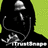 Pixelated image of a character with dark hair and a helmet, set against a green background with text overlays.
