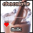 A 4-frame animated contact sheet showing a chocolate drink with milk being poured, featuring red heart symbols in different positions across frames.