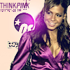 A person with long brown hair wearing a purple top, standing in front of a light background with purple text and a circular logo.