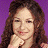 A 48x48 pixel animated contact sheet showing two frames: a woman with long brown hair against purple background on left, and red house graphic with "ARRESTED" text above it on right.
