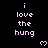Pixelated text 'i love the hung' in light purple on black background with small heart symbols, arranged in a pattern