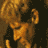 Pixelated static image of a figure with light brown hair and orange-toned clothing against dark background, rendered in low-resolution 256x256 pixels with visible dithering and blocky artifacts.