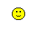 Yellow smiley face with black eyes and mouth, interacting with red-and-white Poké Ball objects in various states of motion and expression changes.