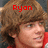 A pixelated image of a person with brown hair wearing a red garment, with red text above the head changing across frames.