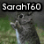 A static image shows a gray cat with raised paw, green grass background, and text 'SarahT60' at top; a black-and-white heart symbol with 'Luvs' text; and a brown cat with 'Animals' text at bottom.