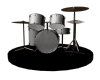 Animated drum kit on black circular base with metallic silver drums, brown snare, and cymbals in various configurations across frames.