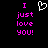 Pixelated text reads "I just love you!" in bright pink on black background with white heart symbol above.
