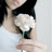 A person holds a white flower against a light background, with text on the right reading 'but... i like you more then a friend <3'.